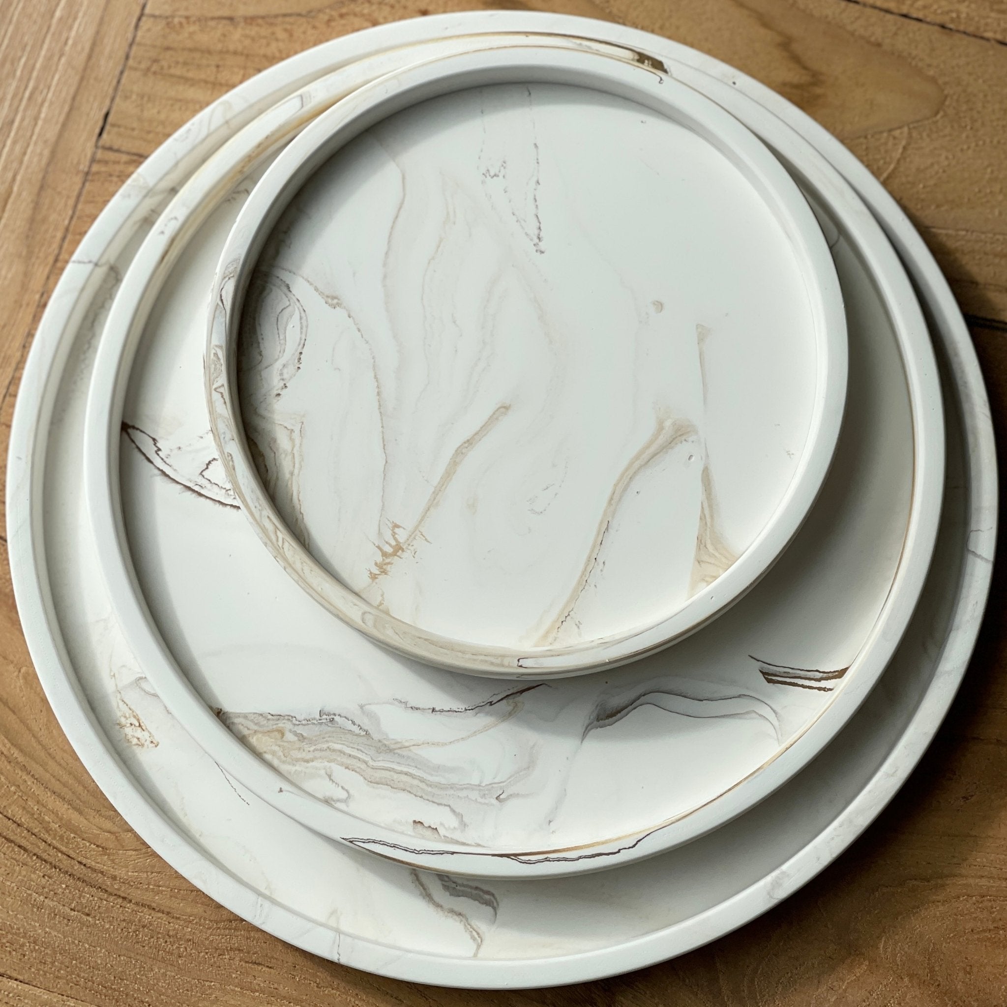 Plateaux rond en jesmonite marbré beige trois tailles